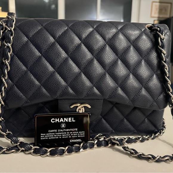 Selling this Chanel Classic Double Flap Jumbo purse. (Navy in silver hardware) - Picture 2 of 6